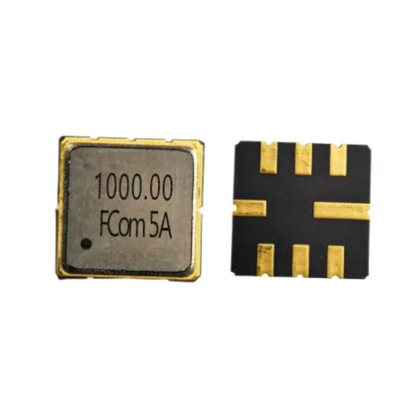 FCom FSF-5050-1000M 1000 MHz SAW filter marked 1000.00, with the top face on the left and eight bottom solder pads on the right